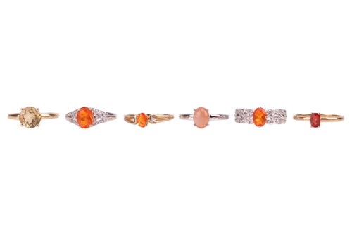Lot 9 - Six 9ct gold dress rings set with orange...