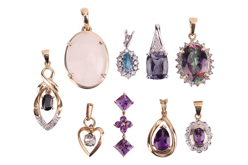 Lot 4 - A collection of nine gem-set pendants; to...