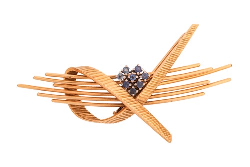 Lot 285 - A sapphire-set spray brooch, curved wires...