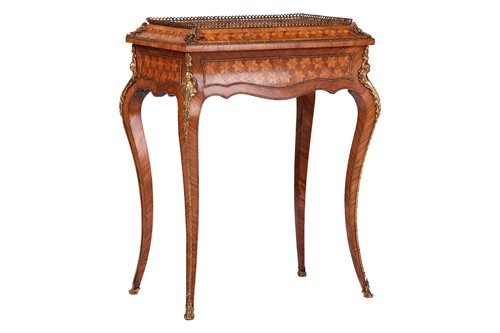 Lot 24 - A Louis XV style kingwood and parquetry...