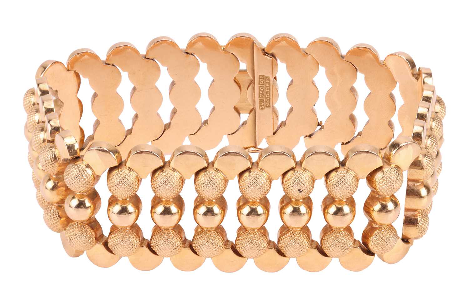 Lot A wide articulated bracelet, comprising a...