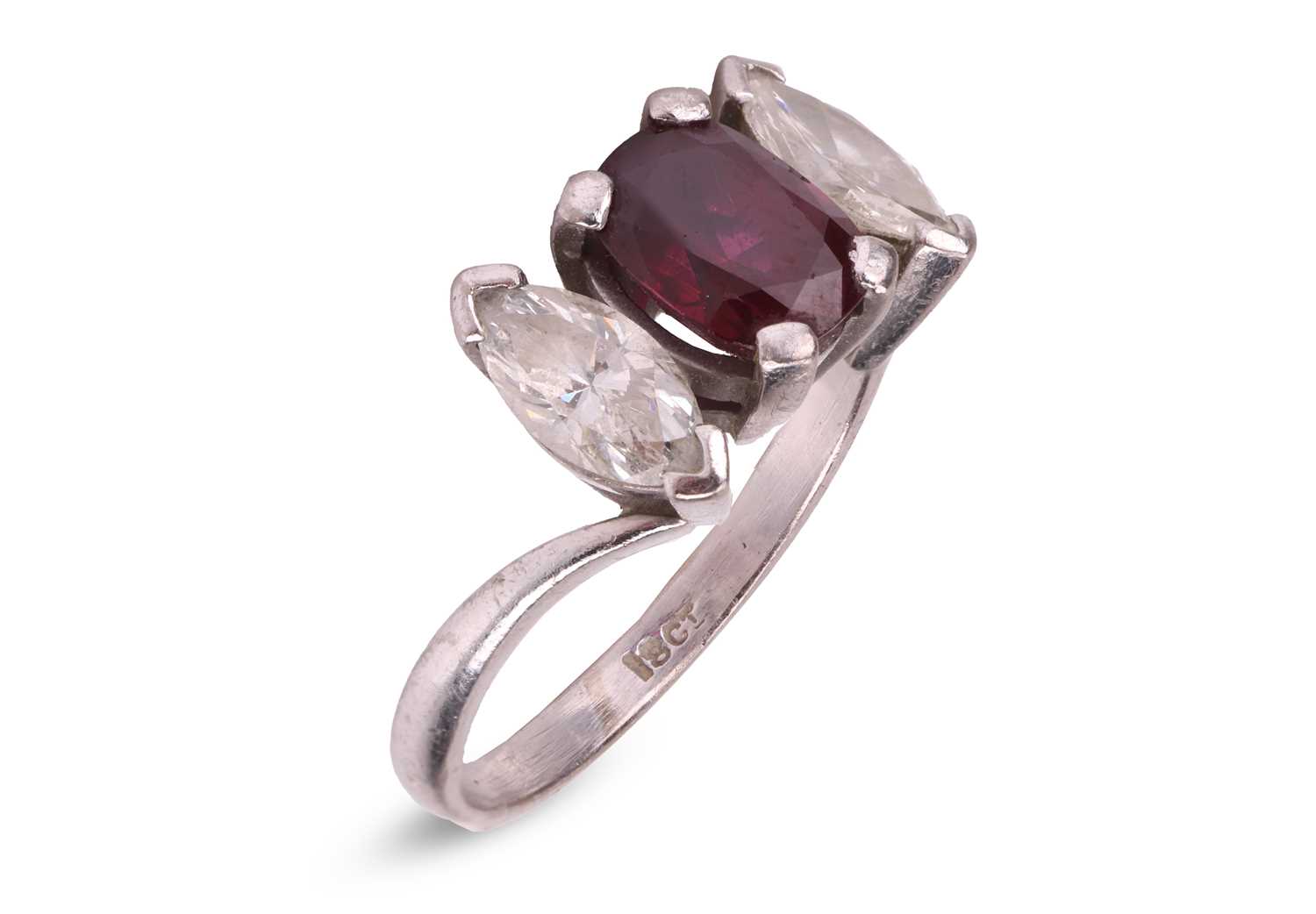 Lot A ruby and diamond-set ring, composed of an...