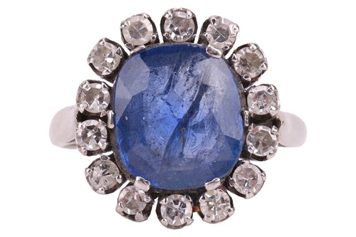 Lot A sapphire and diamond cluster ring, centred...