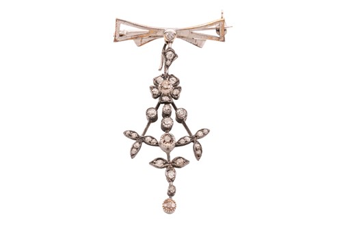 Lot 141 - A diamond-set brooch cum pendant, comprising a...