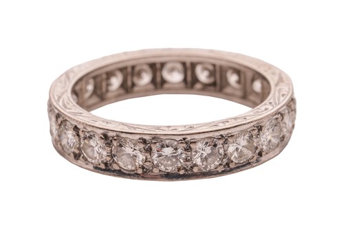 Lot 59 - A diamond eternity ring, grain-set with twenty...