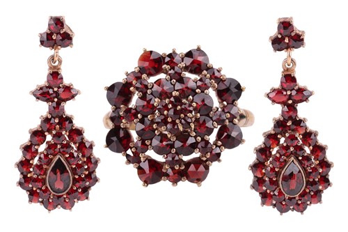 Lot 272 - A garnet-set cluster ring, of floral design,...