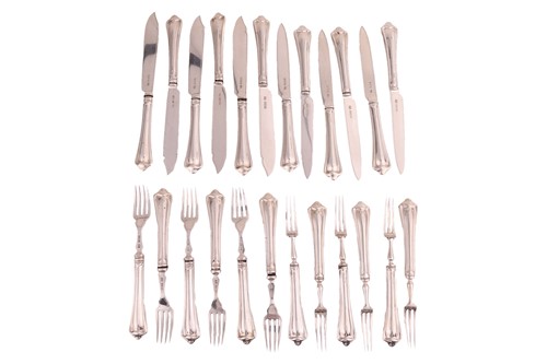 Lot 73 - A set of six Edwardian silver fruit eaters and...