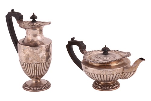 Lot 441 - An Edwardian silver teapot and hot water pot,...