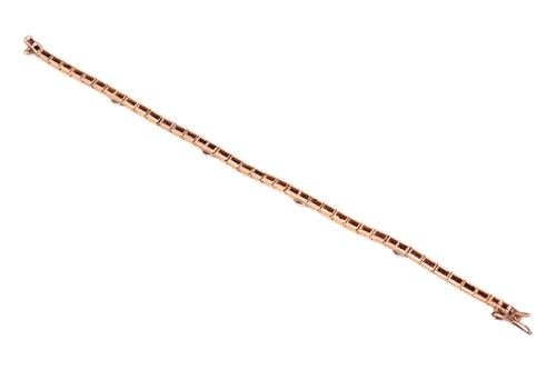 Lot An Art Deco gem-set line bracelet, comprising...