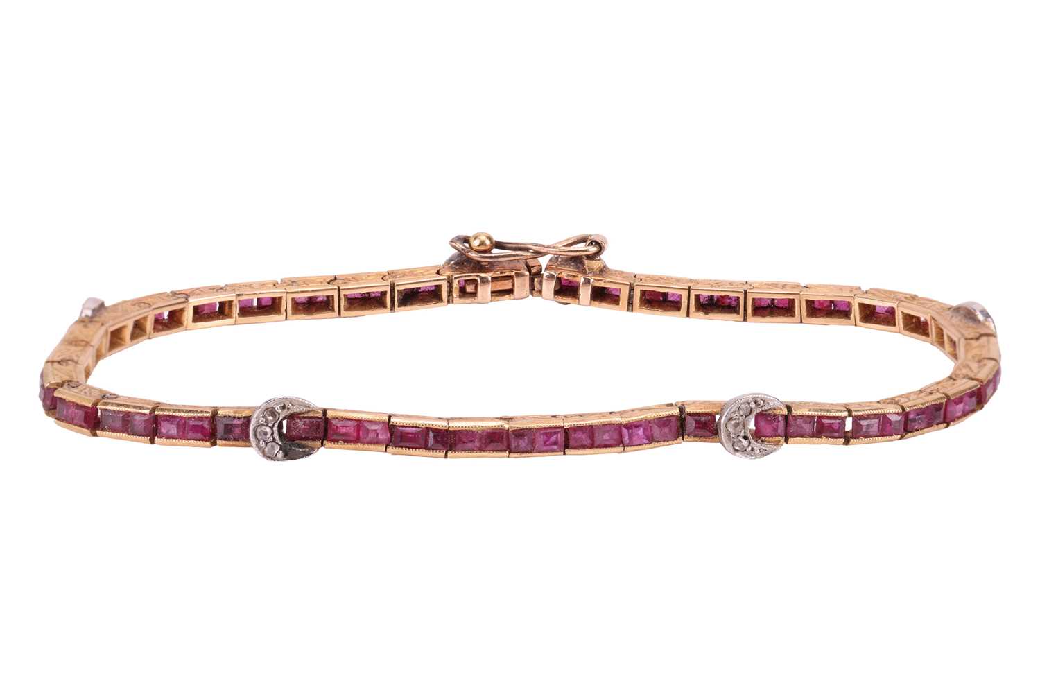 Lot An Art Deco gem-set line bracelet, comprising...