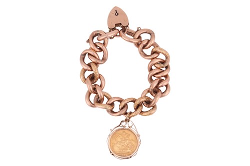 Lot 49 - A curb link bracelet, with an attached mounted...