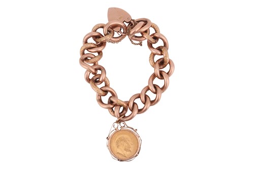 Lot 49 - A curb link bracelet, with an attached mounted...