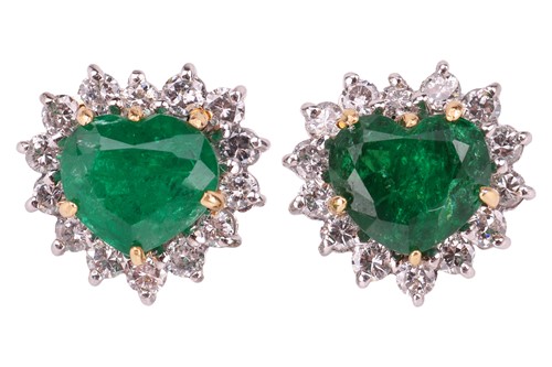Lot 330 - A pair of emerald and diamond-set cluster...