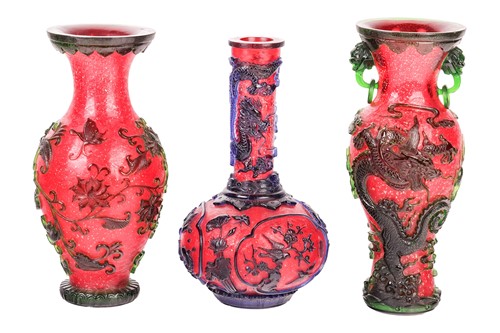 Lot 27 - Three Chinese red crackle glass vases, 20th...