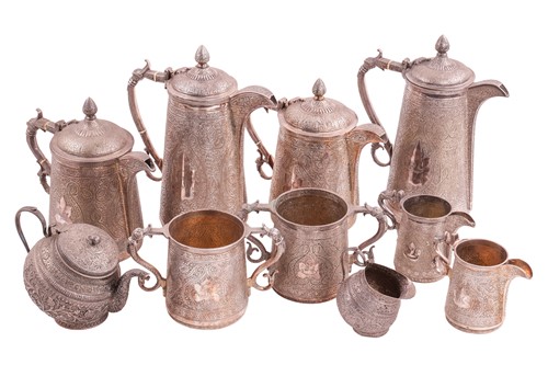 Lot 444 - An Indian Kutch silver inclined teapot and...