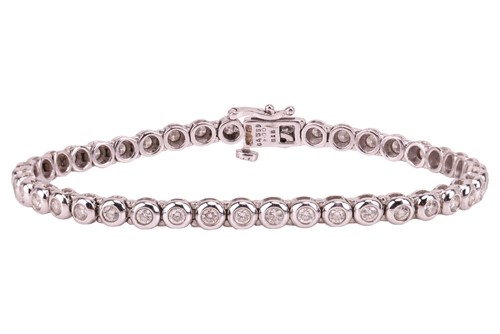 Lot 263 - A diamond-set line bracelet, composed of forty-...