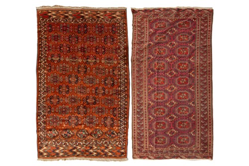 Lot 162 - An antique Fuchien/ red ground Turkoman carpet...