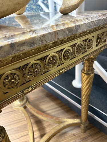 Lot 74 - A Louis XVI style carved wood and gilt gesso...