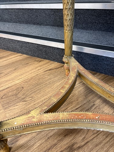 Lot 74 - A Louis XVI style carved wood and gilt gesso...