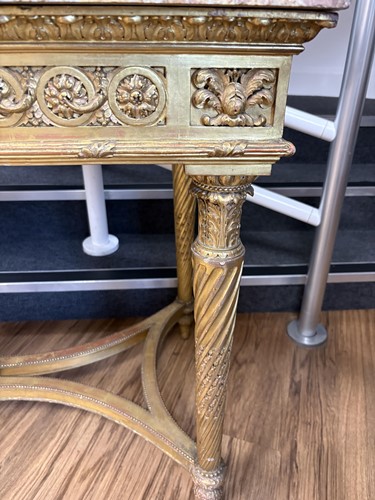 Lot 74 - A Louis XVI style carved wood and gilt gesso...