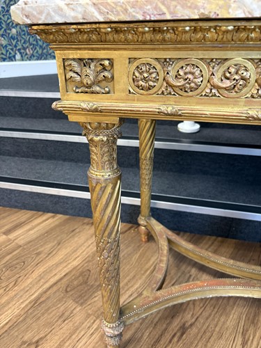Lot 74 - A Louis XVI style carved wood and gilt gesso...