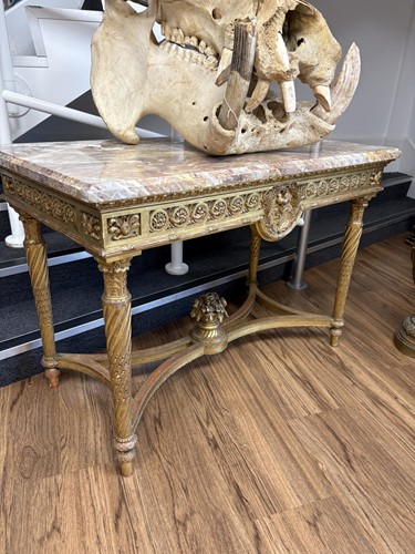 Lot 74 - A Louis XVI style carved wood and gilt gesso...