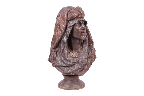 Lot 197 - A large patinated spelter bust of an arab man,...