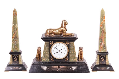 Lot A late 19th-century slate and onyx clock...