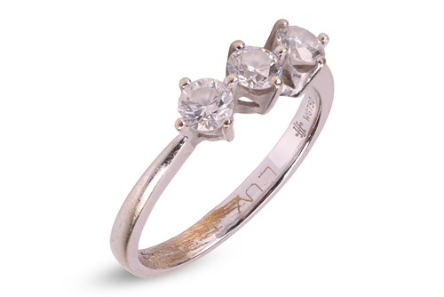 Lot 61 - A diamond-set three-stone ring, composed of...