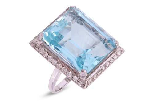 Lot 192 - A large aquamarine and diamond cocktail ring,...