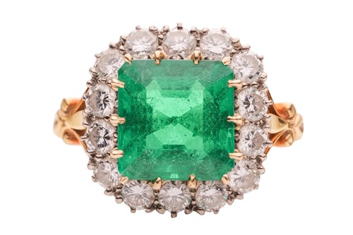 Lot A Colombian emerald and diamond cluster ring,...