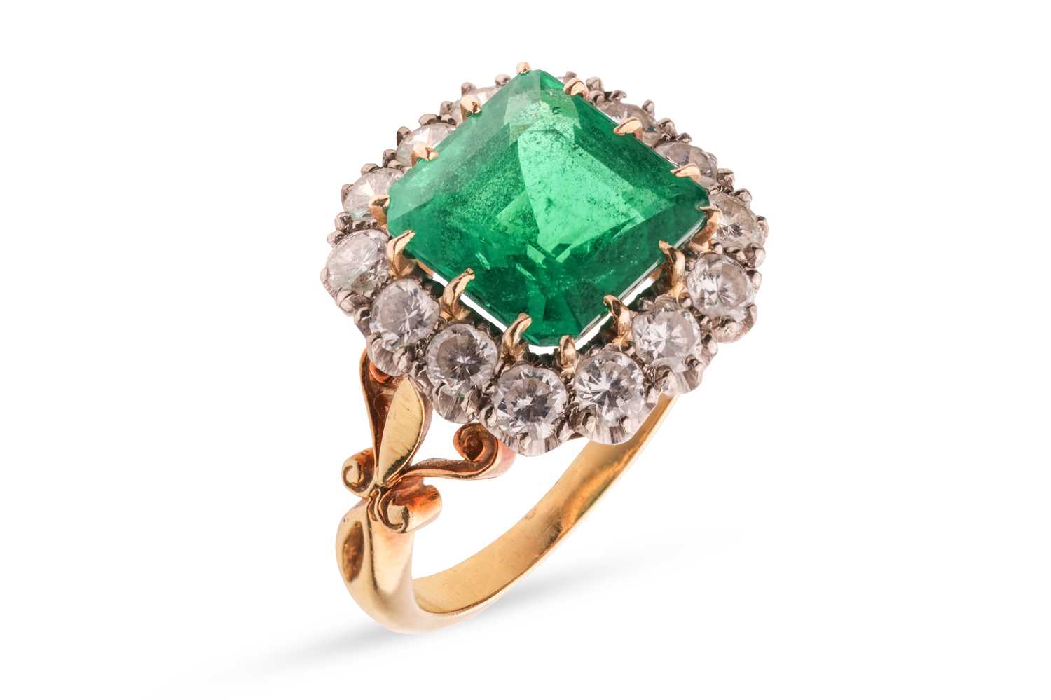 Lot A Colombian emerald and diamond cluster ring,...