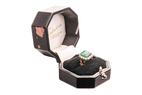 Lot A Colombian emerald and diamond cluster ring,...