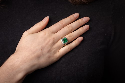 Lot A Colombian emerald and diamond cluster ring,...