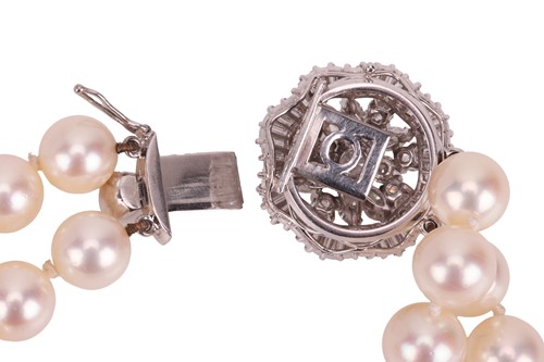 Lot 100 - A two row cultured pearl necklace, with a...