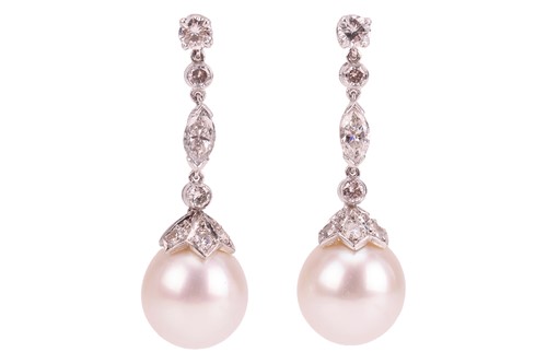 Lot 204 - A pair of diamond and pearl drop earrings, the...