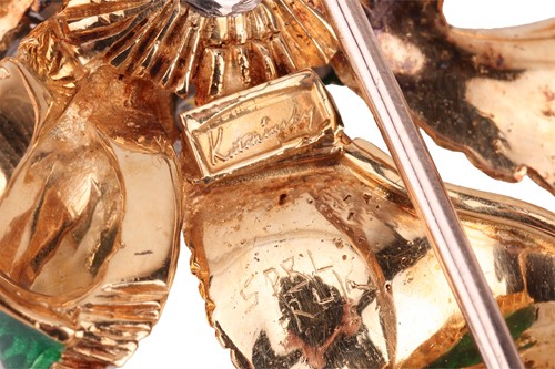 Lot Kutchinsky - A diamond and enamel bow brooch...