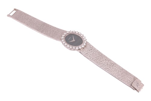 Lot Piaget An 18ct White Gold Diamond-Set...