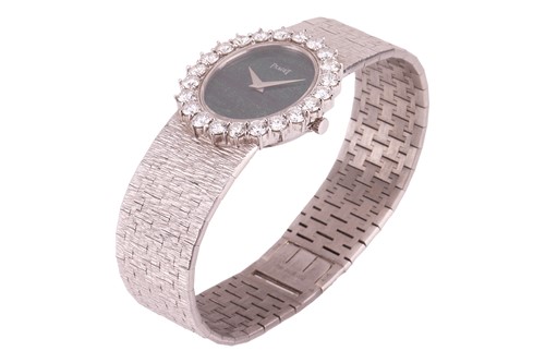 Lot Piaget An 18ct White Gold Diamond-Set...