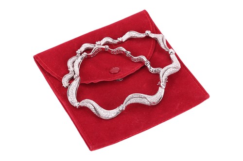 Lot 241 - Damiani - a diamond necklace from the Gemilli...