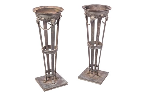 Lot A pair of tall Neoclassical patinated bronze...