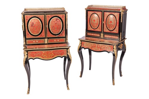 Lot A near pair of 19th century French ebonized...