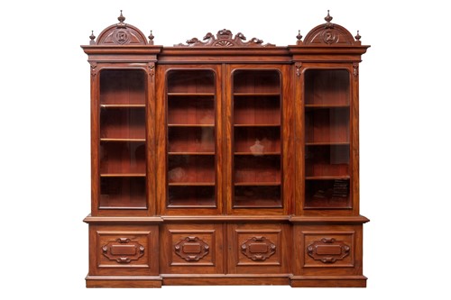 Lot 57 - An Italian mahogany reverse breakfront...