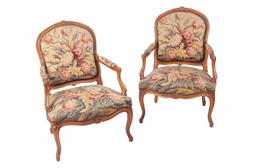 Lot A pair of Louis XV style walnut fauteuil la...