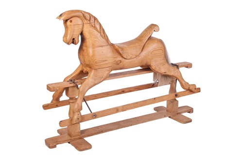 Lot 30 - A large pine rocking horse, with horsehair...