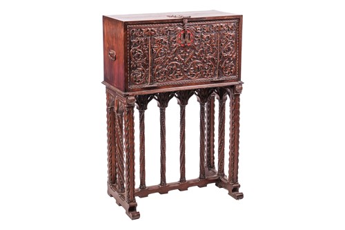 Lot 32 - A Spanish carved walnut vargueno on stand of...