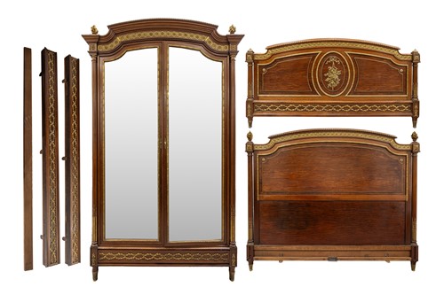Lot 34 - A Louis XVI style mahogany and ormolu mounted...