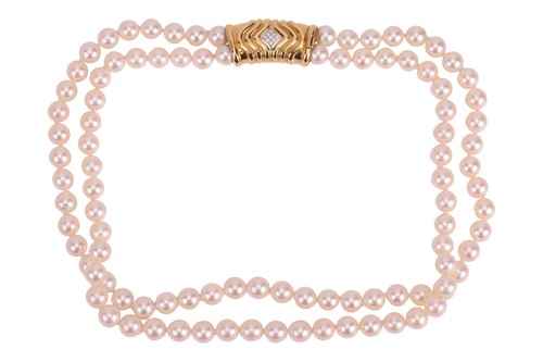 Lot 137 - A two row cultured pearl necklace, to an18...