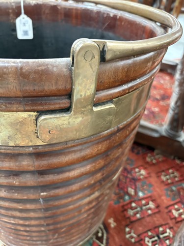 Lot 36 - A pair of late George III brass bound mahogany...