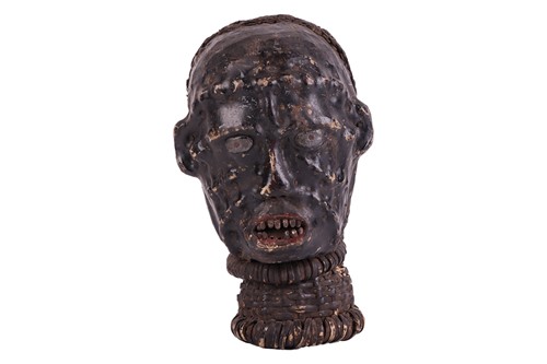 Lot 28 - A Nigerian Ekoi head, 20th century, 30 cm high.